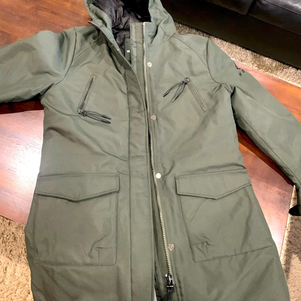 Brand new/never worn ski jacket. Beautiful army green color. Runs small.